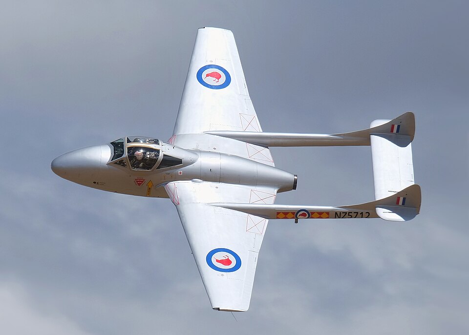 de Havilland Vampire jet fighter banking in flight