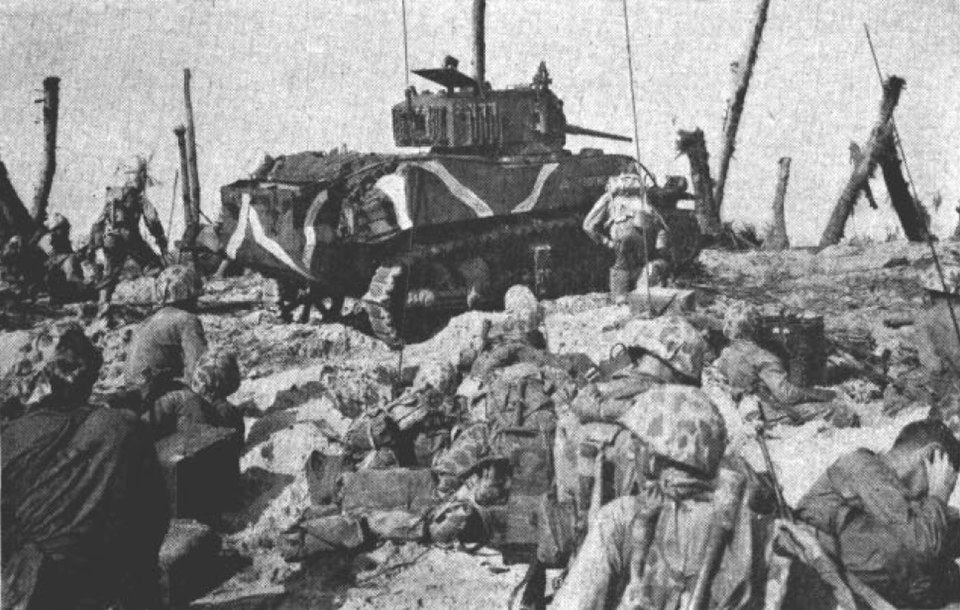 M5A1 Stuart light tank of the US Marine Corps advancing on Namur, Kwajalein Atoll, February 1944